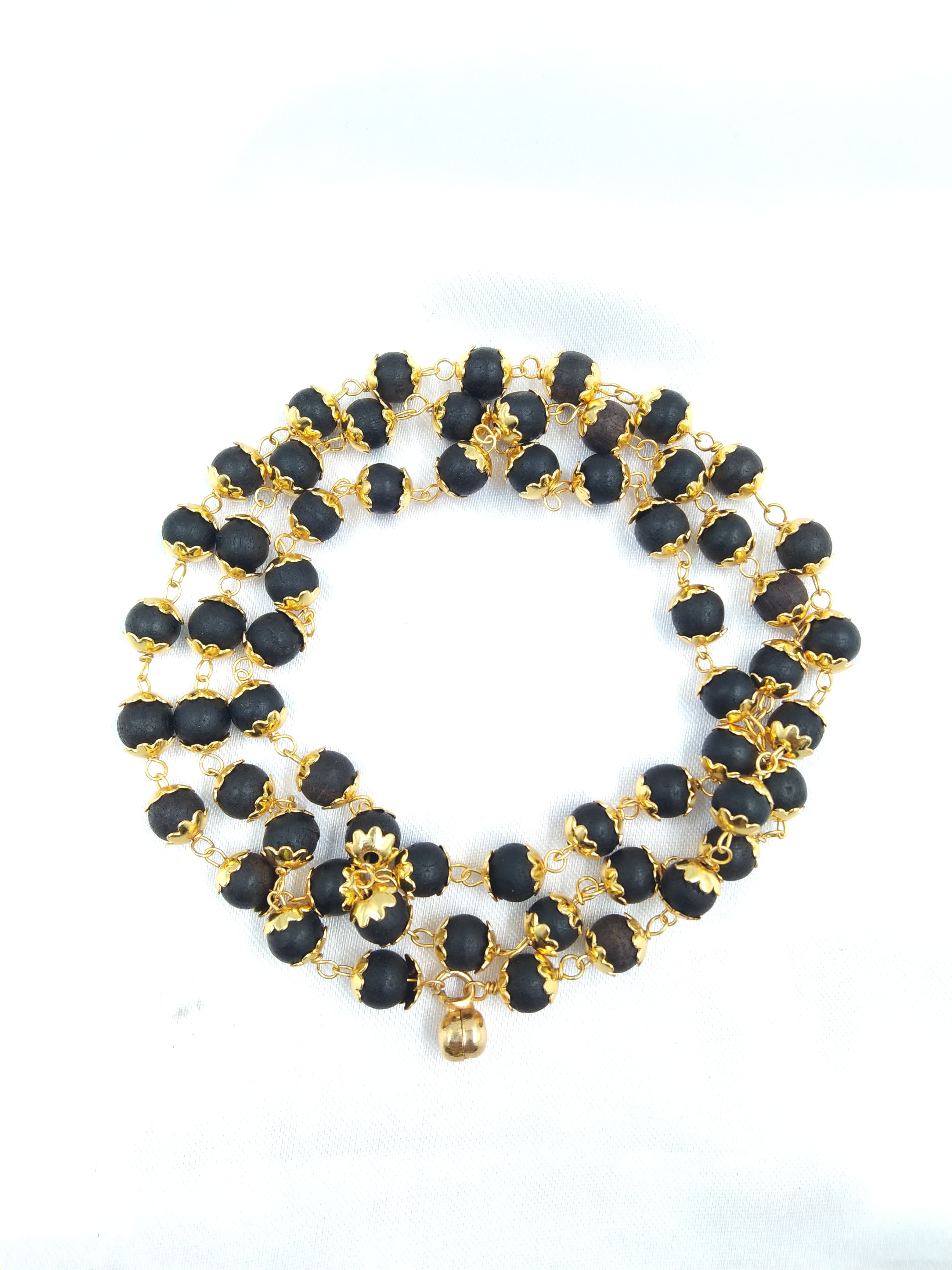 Karungali malai and bracelets gold colour